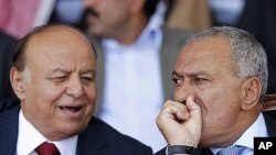 Yemen's Vice President Abed Rabo Mansour Hadi, left, pictured here with President Ali Abdullah Saleh during a gathering of Saleh's supporters in Yemen's capital Sana'a on March 10, 2011