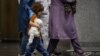 Afghan evacuees arrive at Incheon International Airport in Incheon, South Korea, Aug. 26, 2021, after fleeing from their country following the Taliban's military takeover of Afghanistan. 