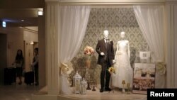 FILE PHOTO: A wedding shop display is seen at an official hotel of the Rugby World Cup in Sapporo, Japan September 23, 2019. REUTERS/Edgar Su/File Photo