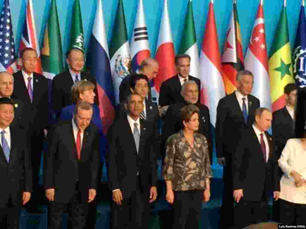 U.S. President Barack Obama, center, joins other Group of 20 world leaders for a group photo in Antalya, Turkey, Nov. 15, 2015. 