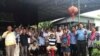 Former officials from the now-dissolved Cambodia National Rescue Party gathered for a noodle-eating party in Anglong Ville commune in Battambang province and took this group photo in support of the Clean Finger Campaign (courtesy photo)