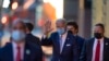 President-elect Joe Biden waves as he leaves The Queen theater in Wilmington, Delaware, Nov. 24, 2020.