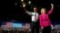 President Barack Obama waves to the crowd with Democratic presidential candidate Hillary Clinton during a Clinton presidential campaign event in Charlotte, North Carolina, July 5, 2016.