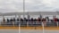 Migrants from Cuba, Venezuela and Central America queue at the Paso del Norte International Bridge in Ciudad Juarez, Chihuahua State, Mexico, to cross the border and request political asylum in the United States, on Jan. 9, 2019. 