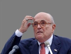 FILE - Rudy Giuliani, an attorney for President Donald Trump, addresses a gathering at a campaign event, in Portsmouth, N.H., Aug. 1, 2018.