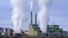 FILE - Steam billows from a coal-fired power plant Nov. 18, 2021, in Craig, Colorado.