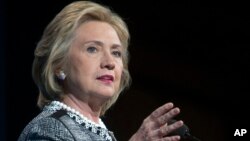 FILE - Former Secretary of State Hillary Rodham Clinton speaks in Washington, May 2014.