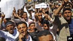 Yemeni anti-government demonstrators shout slogans during a demonstration demanding the resignation of President Ali Abdullah Saleh in Sana'a, Yemen, February 18, 2011