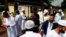 Muslim worshipers walk out after the friday prayer at the Yahya Mosque, in Saint-Etienne-du-Rouvray, Normandy, France, July 29, 2016. Four days after the hostage taking in Saint-Etienne-du-Rouvray, officials and worshipers of the Muslim community paid tribute to priest Jacques Hamel and Christian community. 