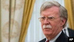 FILE - U.S. President Donald Trump's National Security Adviser John Bolton waits for the beginning of talks with Russian President Vladimir Putin in the Kremlin in Moscow, Russia, June 27, 2018.