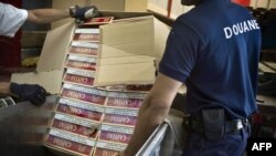 FILE - Seized cigarettes are pictured before being destroyed by French customs July 8, 2010, in Dijon, eastern France. 