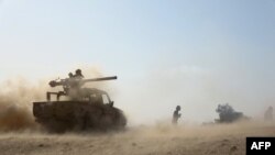 Saudi-backed government troops repel a Huthi rebel offensive on oil-rich Marib, some 120 kilometres (75 miles) east of Yemen's rebel-held capital Sanaa, on Feb. 14, 2021.