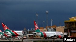 FILE: Kenya Airways planes are seen parked during an earlier pilots strike organized by Kenya Airline Pilots Association (KALPA). Taken at the Jomo Kenyatta International airport near Nairobi, April 28, 2016. 