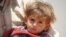 FILE - At the Za'atari camp in Jordan in June 2015, Morhaf's mother, Aziza Ghazawi, says all six of her children are in poor health since the war began.