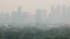 FILE - A thick layer of smog covers Lumpini Park in central Bangkok, Thailand, Thursday, Jan. 31, 2019.