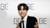 FILE - J-Hope, anggota grup K-pop Korea Selatan BTS saat konferensi pers untuk memperkenalkan album baru mereka "BE" di Seoul, Korea Selatan, 20 November 2020. (Lee ​​Jin-man/AP)