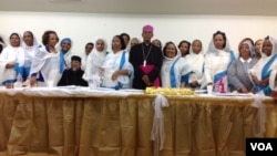 FILE: Bishop Fikremariam Hagos with parishoners. Taken January 28, 2014
