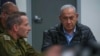 This photo taken from a video released by the Israeli government shows Prime Minister Benjamin Netanyahu attending a meeting in the command center of the Defense Ministry in Tel Aviv on Oct. 26, 2024, as Israel conducted strikes on military targets in Iran.