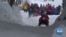 Bavarian Thrill-Seekers Hurl Down Snowy Alps in Horned Sleds