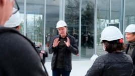Architect Winy Maas speaks to reporters on the roof of the new Depot Boijmans Van Beuningen in Rotterdam, Netherlands, Thursday Sept. 24, 2020.