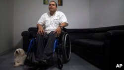 Javier Hernandez, a former employee of a state-run cement factory, is seen during an interview at his home in Guatire, Venezuela, Aug. 3, 2017.