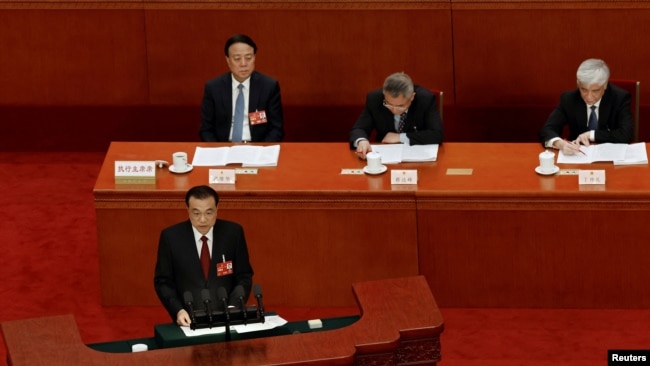 中国国务院总理李克强3月5日在第十四届人大会议上作政府工作报告。