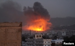 Smoke billows from a fire at a Houthi-controlled military site after it was hit by a Saudi-led airstrike in San'aa, Yemen, June 3, 2015.