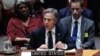 US Ambassador to the United Nations Linda Thomas-Greenfield (L) looks on as US Secretary of State Antony Blinken speaks during a UN Security Council meeting on the conflict between Ukraine and Russia at the United Nations headquarters in New York City on 