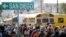Central American migrants line up for a meal at a shelter in Tijuana, Mexico, Nov. 14, 2018.