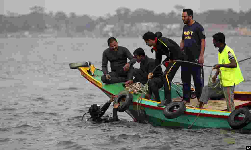 A rescue operation in progress after a ferry capsized in the Meghna River at Munshiganj, south of Dhaka, Bangladesh, Feb. 8, 2013.