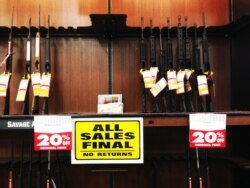 FILE - Several types of weapons, including AR-15 style rifles, are displayed at a gun shop in Virginia. (Photo: Diaa Bekheet)