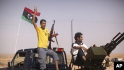 دوو سه‌رهه‌ڵـداوی لیبیا له‌ شوێنێـکی نزیک ناوچه‌ی به‌نی وه‌لید دامه‌زراون، یه‌کشه‌ممه‌ 4 ی نۆی 2011