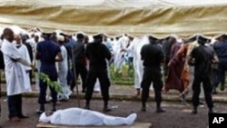Bodies of people killed during a rally are seen at the capital's main mosque in Conakry, Guinea (File Photo - 02 Oct 2009)