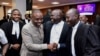 Lawyers celebrate their win in the Supreme Court of Uganda after the court ruled that civilians should no longer be charged in the military courts, at the judiciary headquarters in Kampala, Uganda, Jan. 31, 2025. 