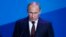 Russian President Vladimir Putin speaks during a meeting with 'Valdai' International Discussion Club members in the town of Valdai, Sept. 19, 2013.