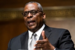 Secretary of Defense nominee Lloyd Austin, a recently retired Army general, speaks during his conformation hearing before the Senate Armed Services Committee on Capitol Hill, Jan. 19, 2021, in Washington.