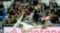 Luka Modric tacle Hakim Ziyech lors d'un match entre le Real Madrid et l'Ajax Amsterdam, Espagne, le 5 mars 2019 (AP Photo/Bernat...