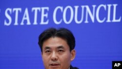 Yang Guang, spokesman of the Hong Kong and Macau Affairs Office of the State Council, speaks during a press conference about the ongoing protests in Hong Kong, at the State Council Information Office in Beijing, July 29, 2019.