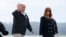 FILE - President Donald Trump and first lady Melania Trump walk from Marine One to board Air Force One at Lawson Army Airfield, Fort Benning, Ga., en route Palm Beach International Airport in West Palm Beach, Fla., March 8, 2019 photo.