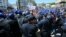 Police officers prevent demonstrators from marching during a May Day protest in Algiers, Algeria, May 1, 2019. 