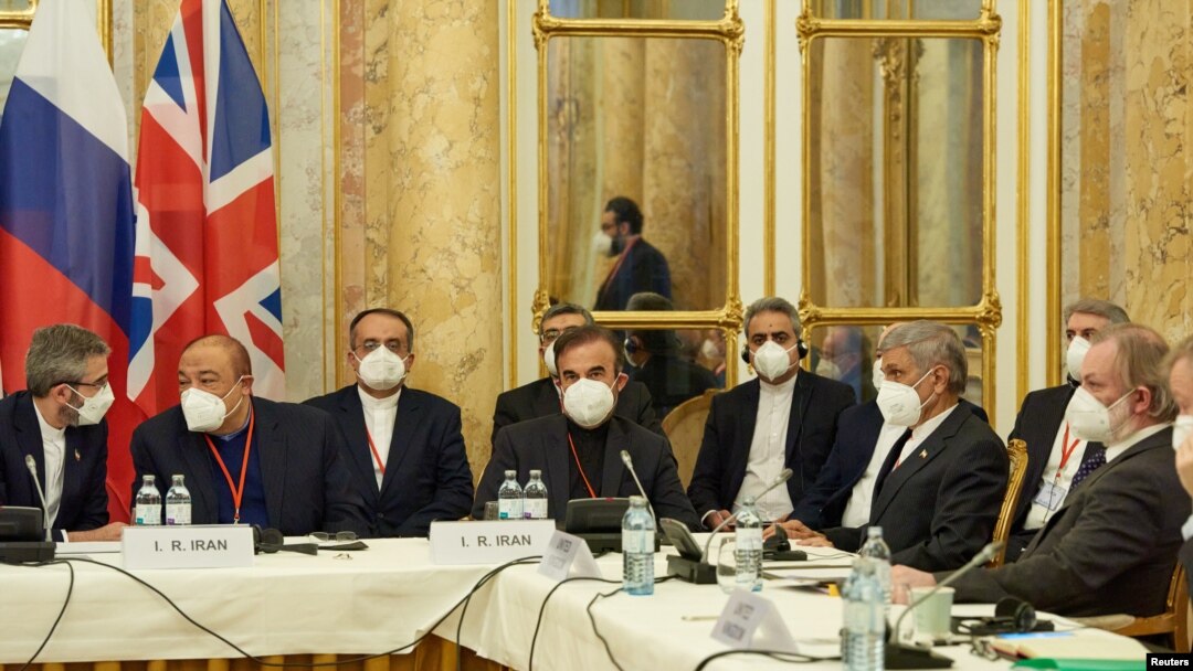 FILE - Iran's chief nuclear negotiator Ali Bagheri Kani and members of the Iranian delegation wait for the start of a meeting of the JCPOA Joint Commission in Vienna, Austria, Nov. 29, 2021. (EU Delegation in Vienna/Handout via Reuters)