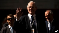Peru's President Pedro Pablo Kuczynski waves as he arrives to an economic forum about Peru after his meeting with Spain's Prime Minister Mariano Rajoy in Madrid, Spain, June 12, 2017. 