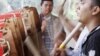 Malaysians of the Mandailing ethnic group perform Gordang Sambilan or Nine Great Drums, near Kuala Lumpur, June 27, 2012.