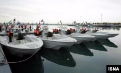 Screengrab from video showing Iranian speed boats during a March 2016 ceremony.