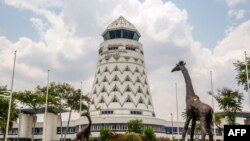 FILE - The control tower is seen at Zimbabwe's main international airport in Harare, Nov. 9, 2017. Earlier this week, authorities arrested five activists at the airport.