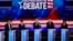 Demokratski kandidati s leva na desno: Andrew Jang, Pete Buttigieg, Joe Biden, Bernie Sanders, Kamala Harris, Miami, 27. juni 2019. (AP Photo/Wilfredo Lee)