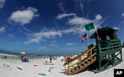 This May 18, 2017 photo shows Siesta Beach on Siesta Key in Sarasota, Florida. (AP Photo, Chris O'Meara)