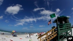 This May 18, 2017 photo shows Siesta Beach on Siesta Key in Sarasota, Florida. (AP Photo, Chris O'Meara)