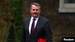 FILE - Britain's Secretary of State for International Trade, Liam Fox arrives for a Brexit subcommittee meeting at Downing Street in London, Britain, May 2, 2018. 