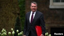 FILE - Britain's Secretary of State for International Trade, Liam Fox arrives for a Brexit subcommittee meeting at Downing Street in London, Britain, May 2, 2018.